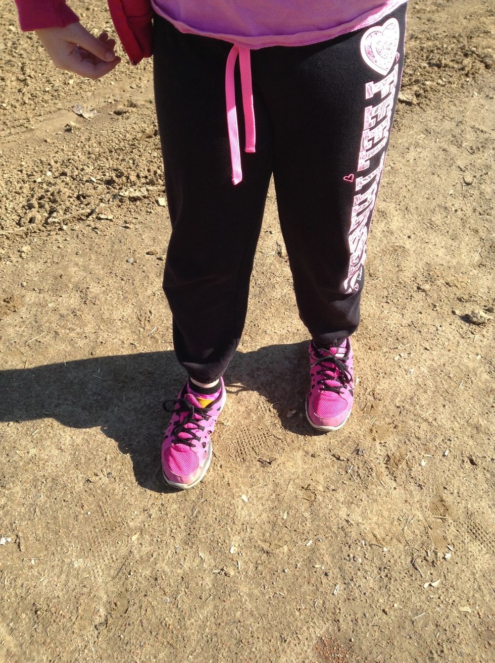 Then, Stand with your right foot in front and your left foot to the side of your right foot and back.