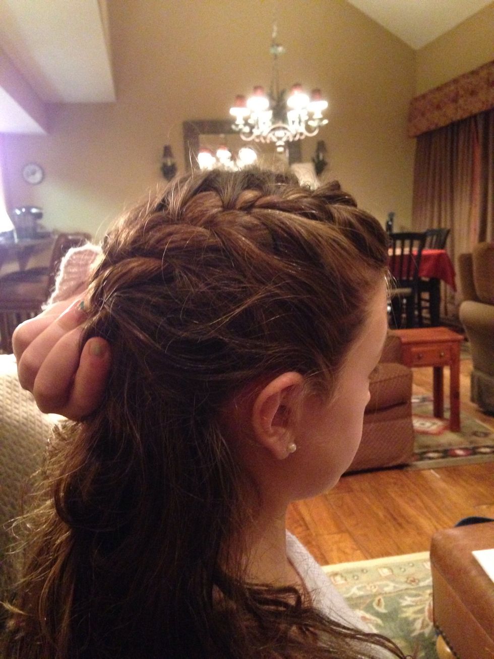 Then start adding pieces from the sides of the braid
