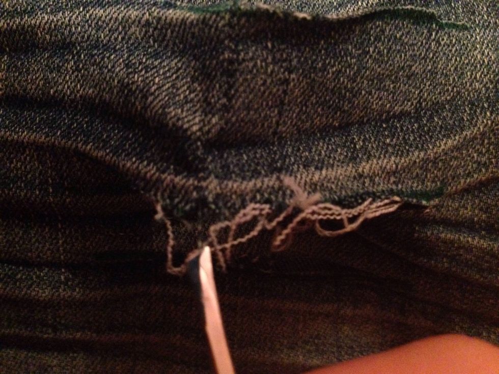 Then start to pull out all the blue threads