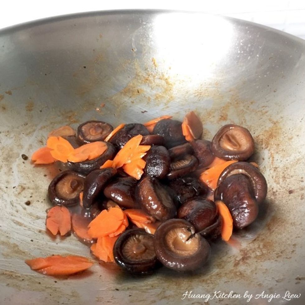 Then stir in the sliced carrots.