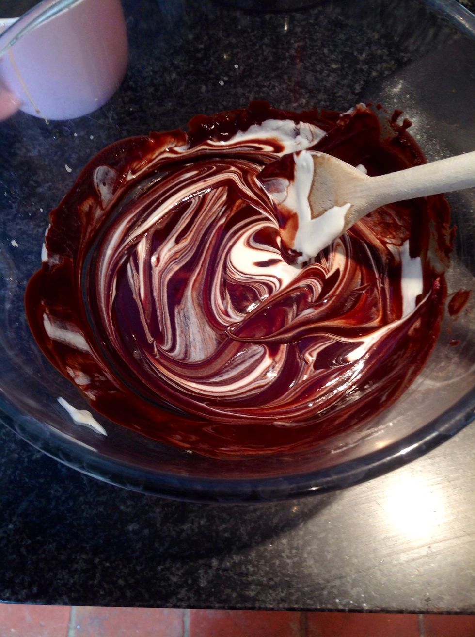 Then stir in the sour cream to the chocolate mix. (Until completely stirred in)