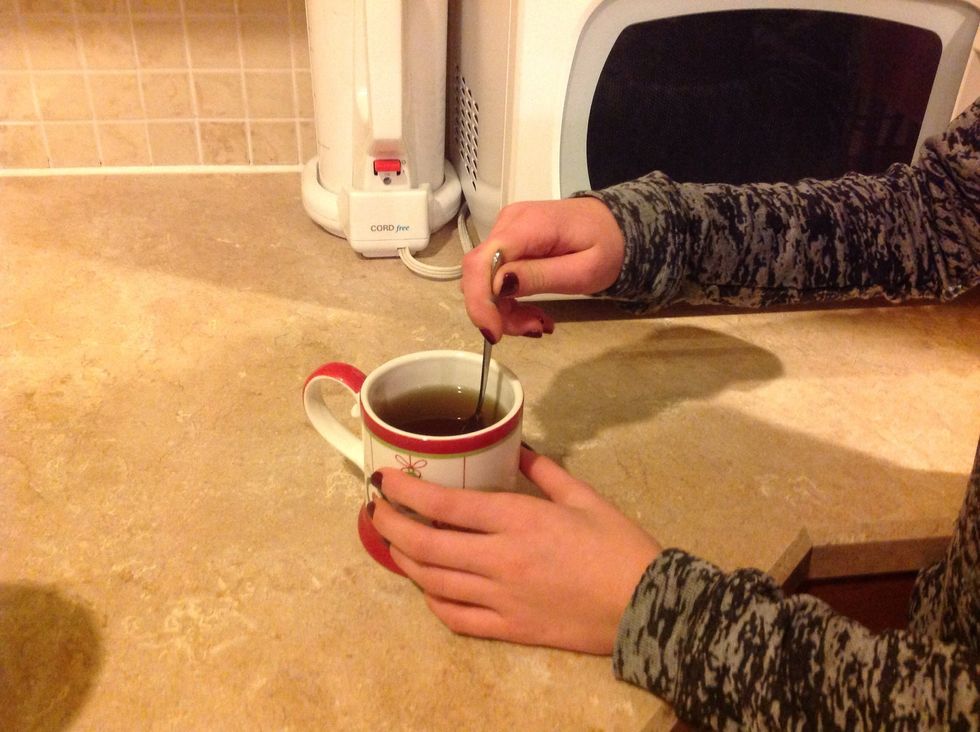 Then stir the honey into your tea.