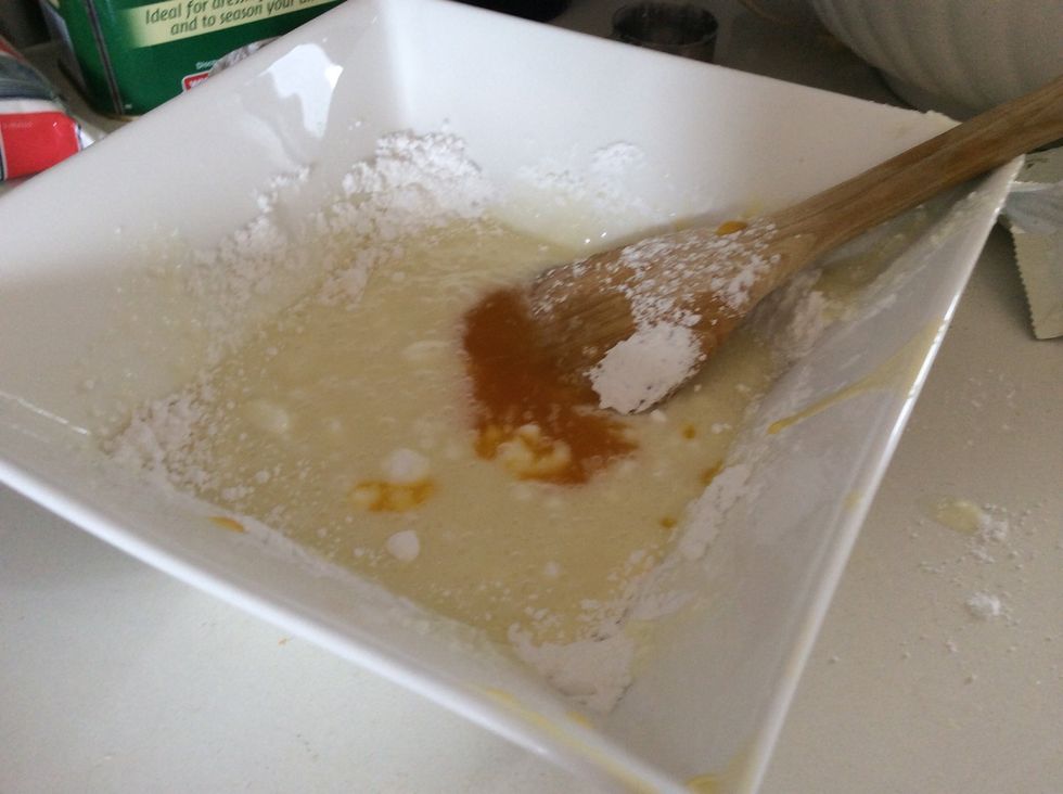 Then strain the extra passion fruit pulp using the sieve to extract 2 tsp of juice and put mix it into the mixture