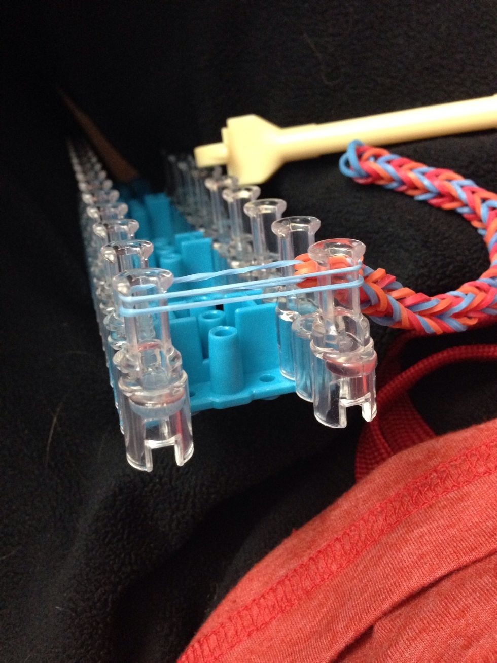 Then stretch it across to put the clip on