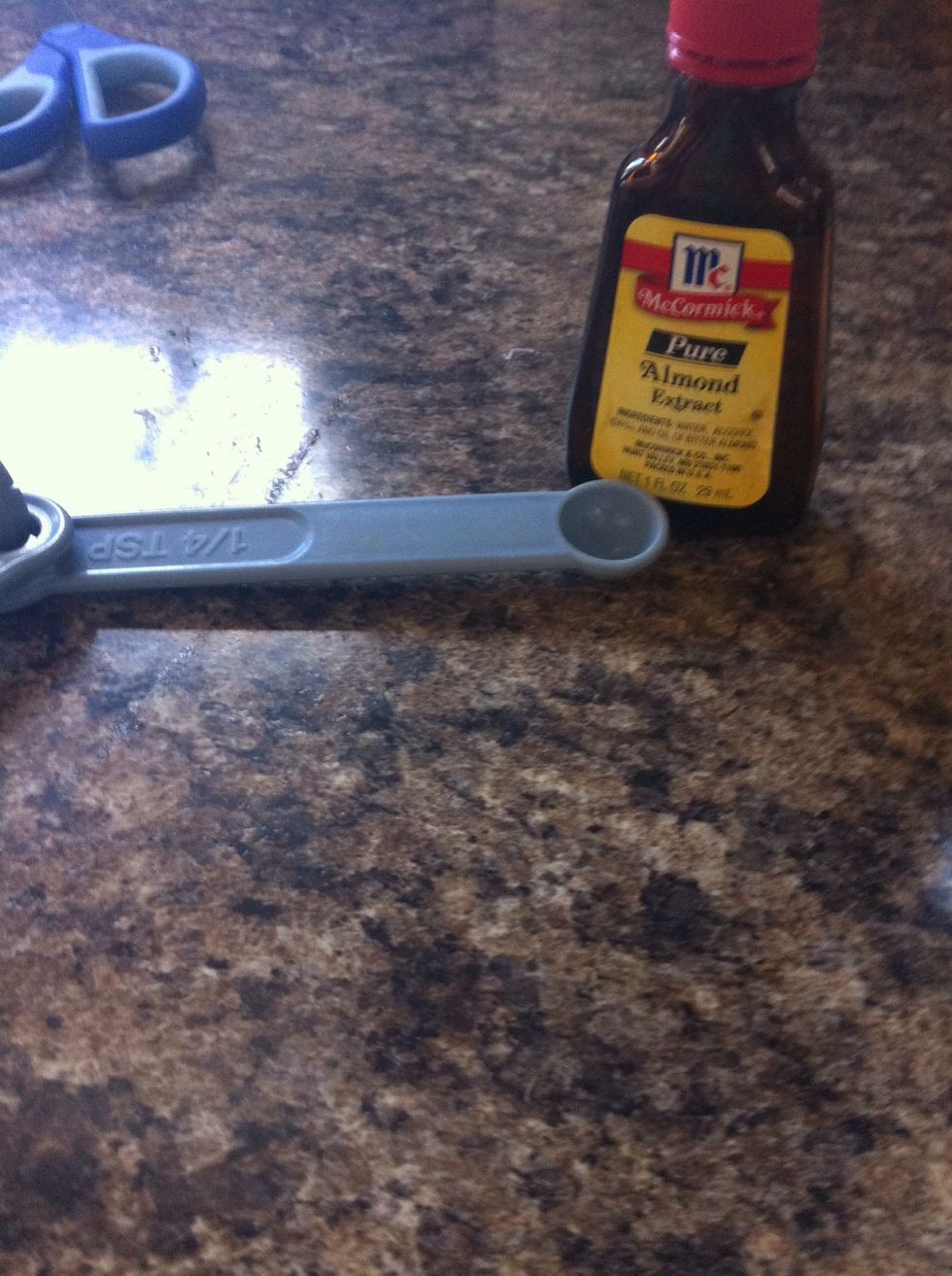 Then take 1/4 a TSP of almond extract, and put it in the mixing bowl.