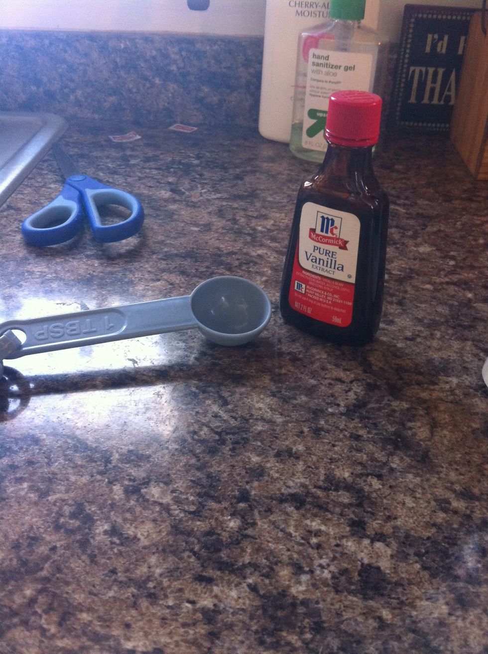 Then take 2 TBSP of pure vanilla extract. Put it in the mixing bowl.