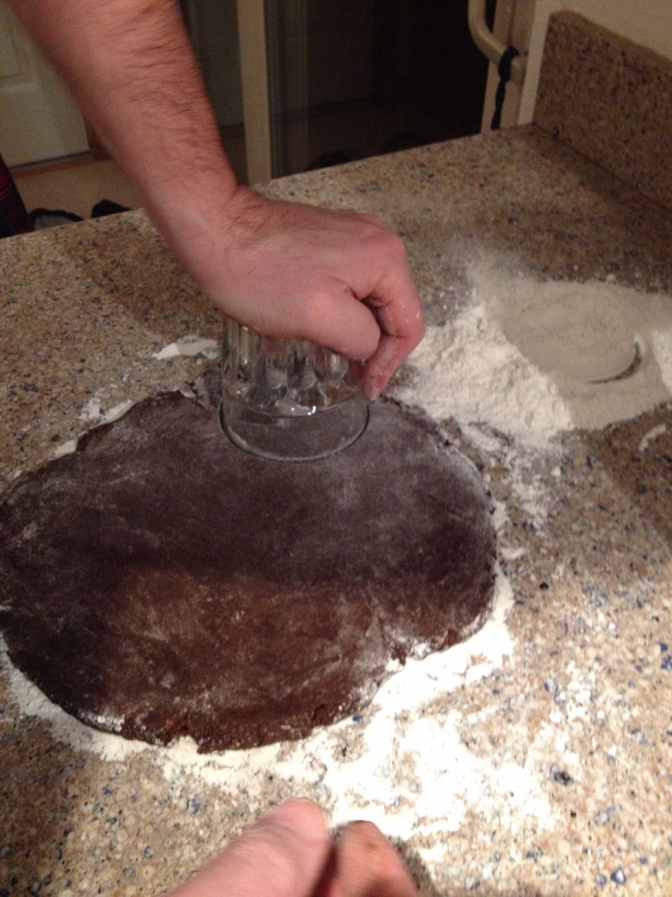 Then take a glass that has a good width and cut your cookies out, or use a biscuit cutter if you like ;)