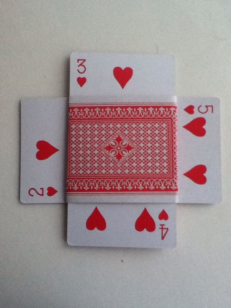 Then take a new folded card and stick 4 cards into, to make the "floor"