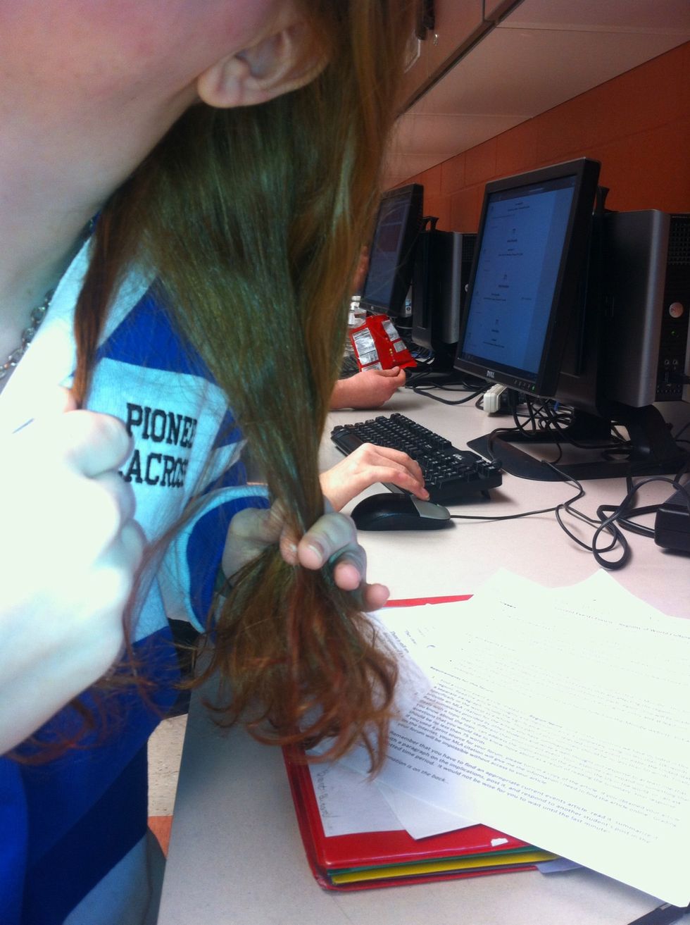 then take a part of hair from the back of one section