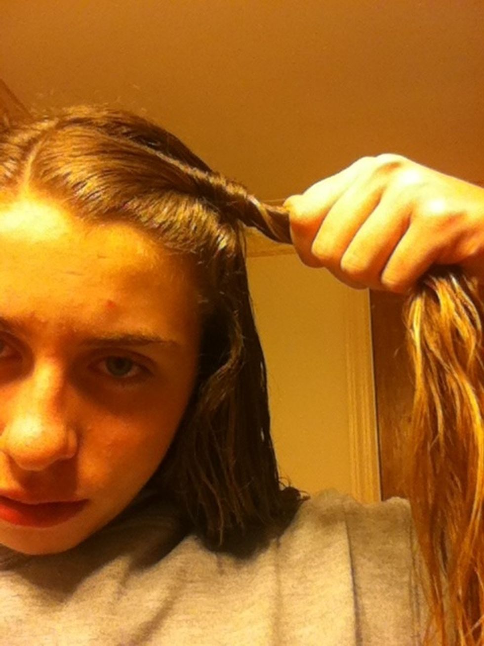 Then take a small amount of hair and twist it.