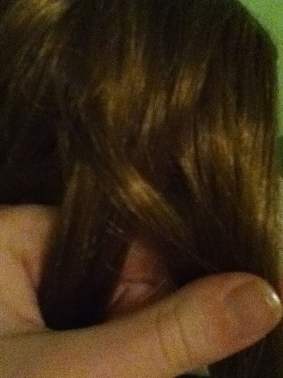 Then take a strand from the outside of the left section and cross it over