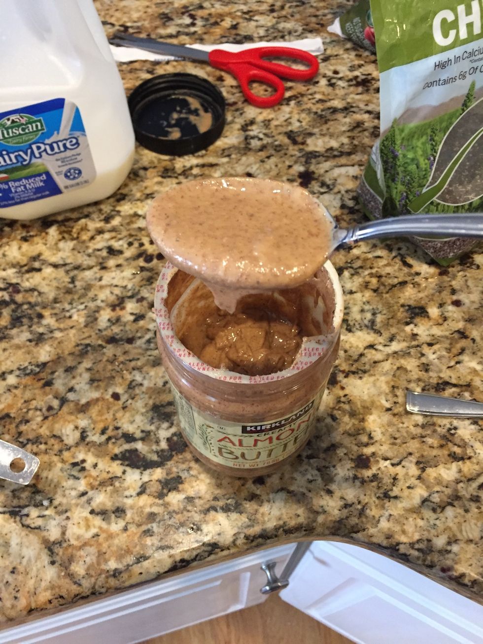 Then take about a tablespoon of almond butter or just peanut butter