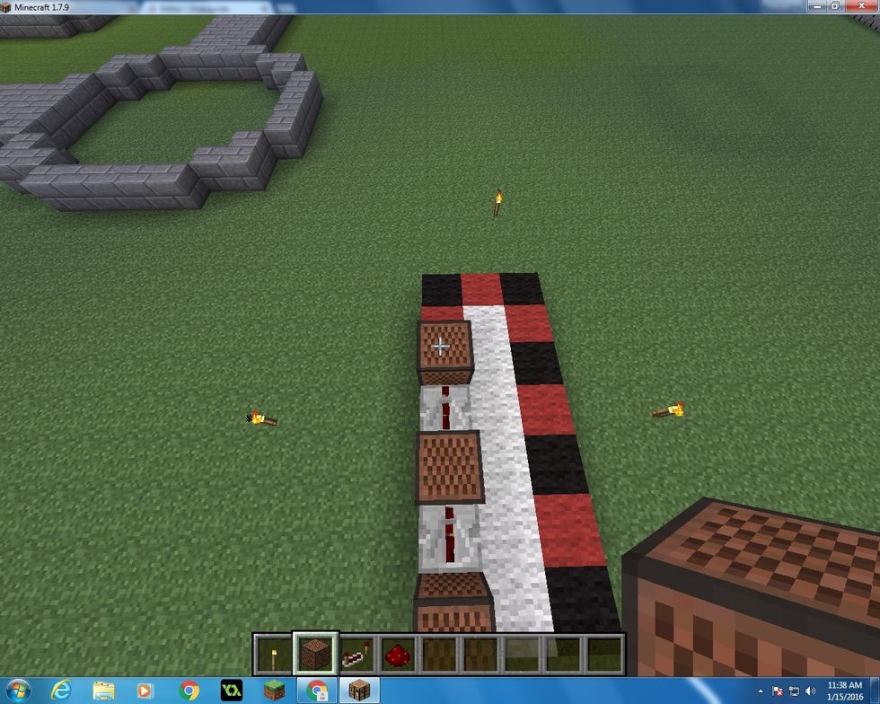 Then take another Note Block and add one in front of the Repeater. Right click it 18 times.