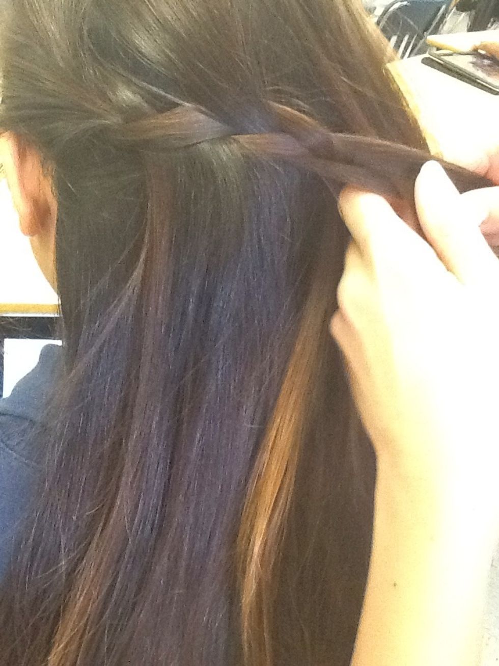 Then take another piece from all of your hair like you did the first time.