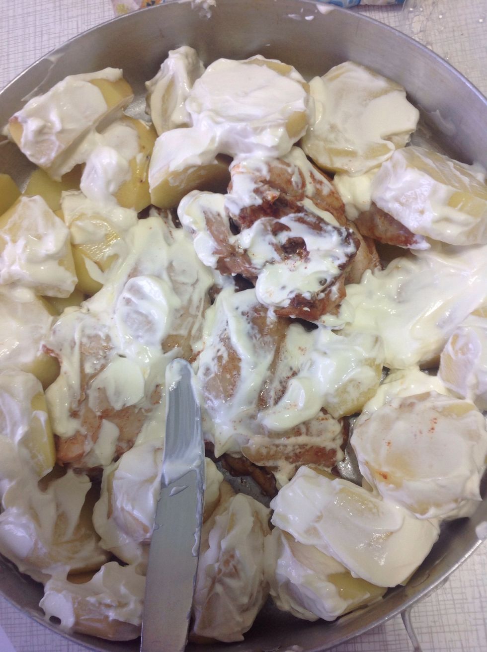 Then take out chicken from the oven and put it with potatoes add some sour cream/mayonnaise