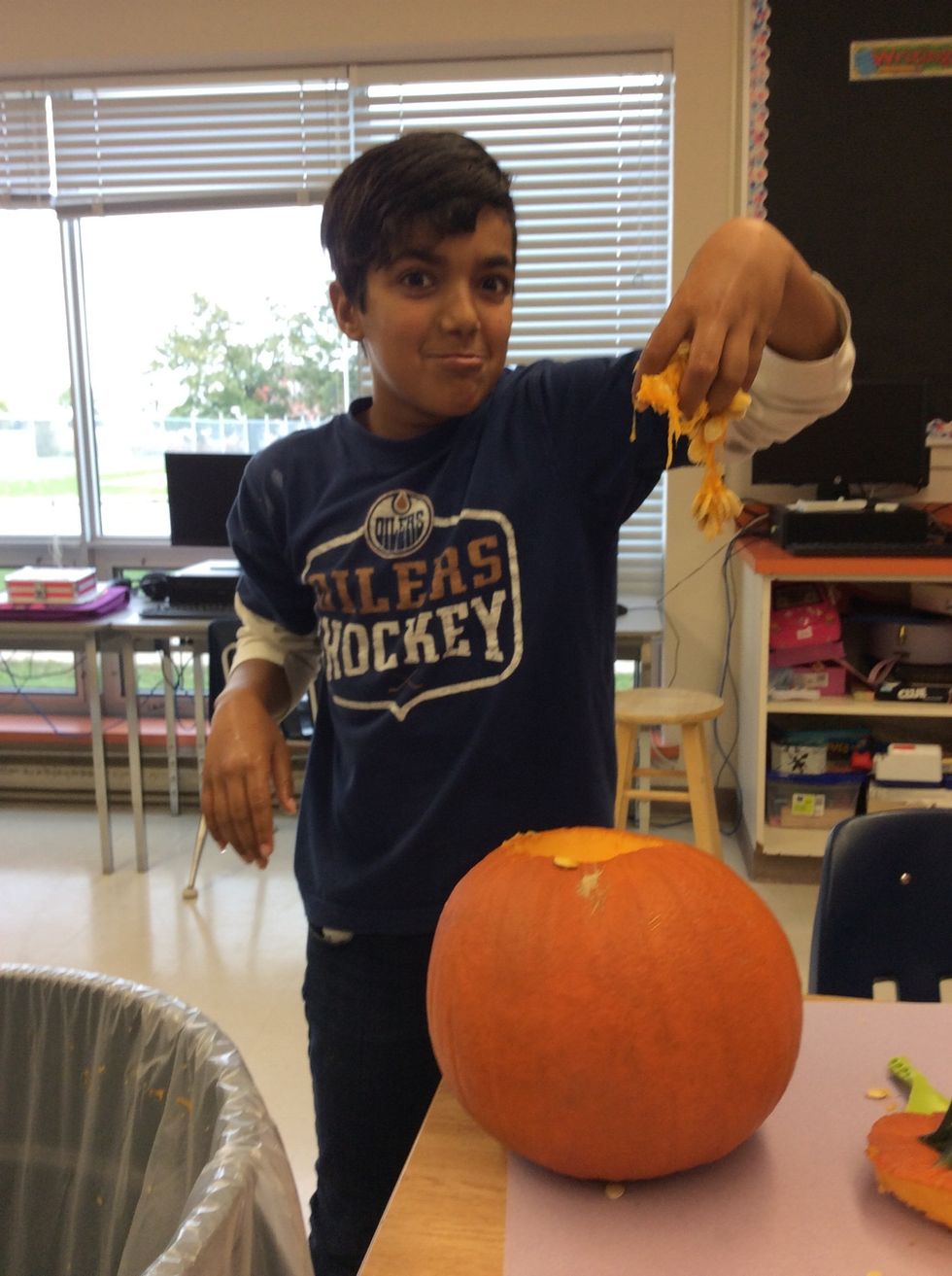 Then take out the disgusting seeds that are in the pumpkin