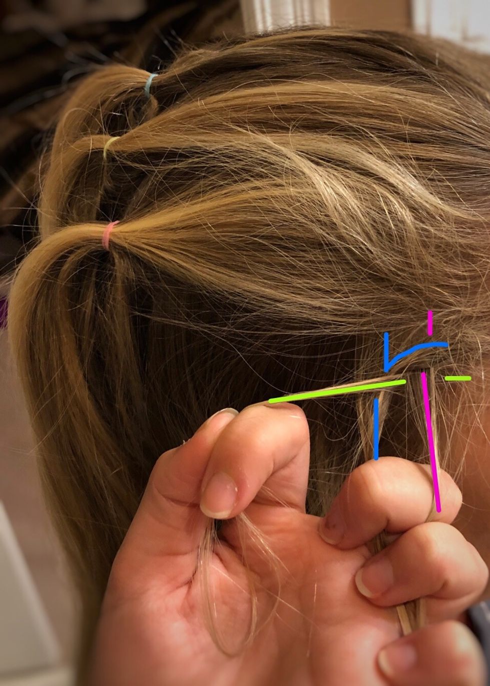 Then take the blue strand and cross it underneath the green (middle) strand.