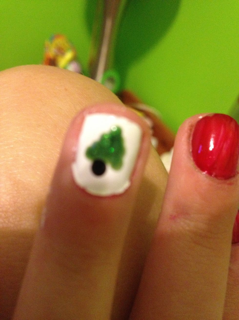 Then take the dotter and make a black dot