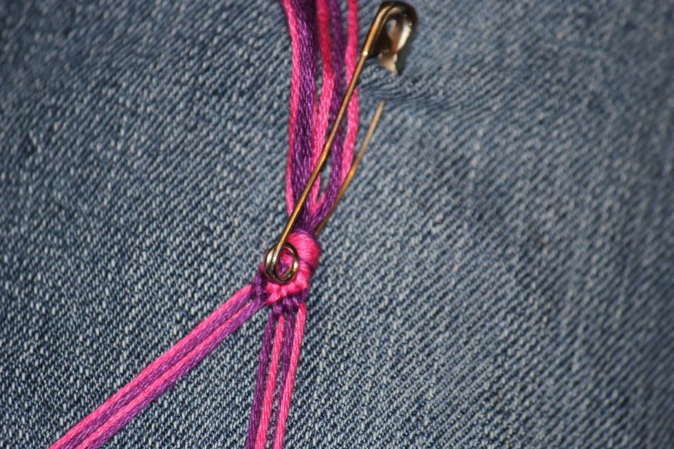 Then take the outside string on the right and tie the backward knot going left on the next three strings.