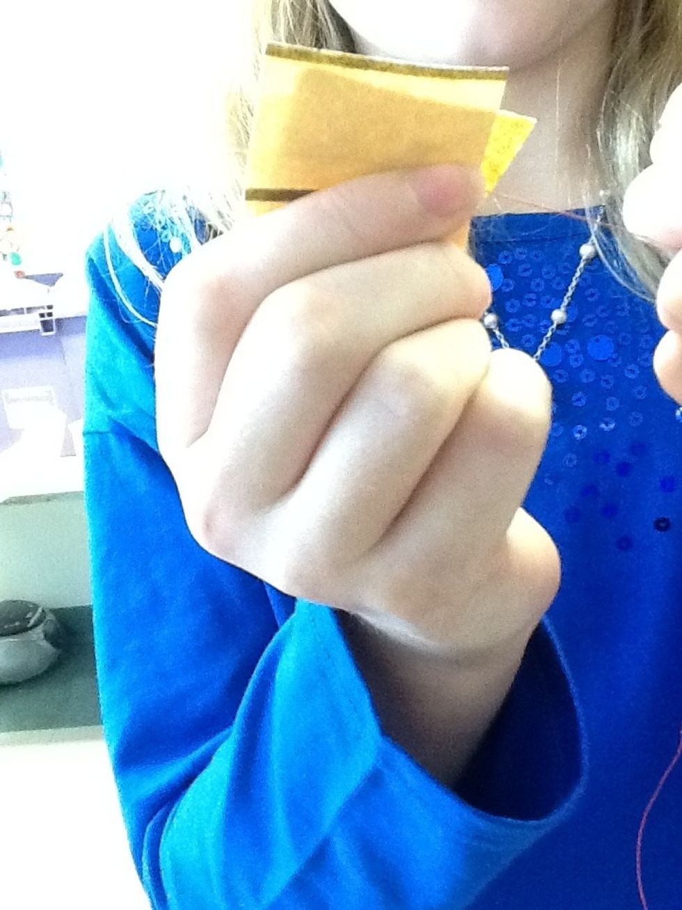 Then take the sandpaper and scrape it on both ends of the red wire until the edges (By ends meaning 2 inches from ends) are not red but a coppery color.