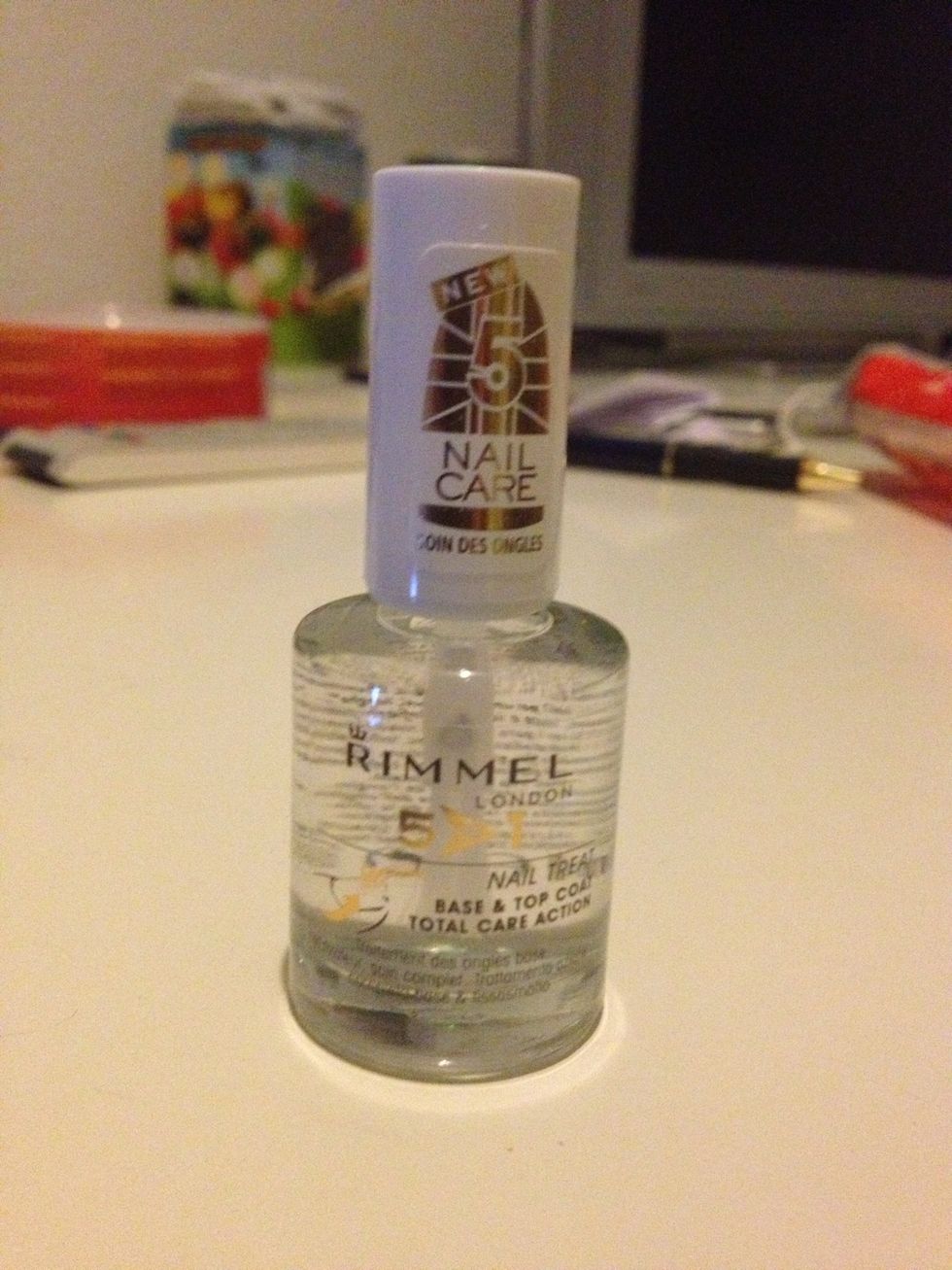 Then take your base coat and apply all over your nails to protect the natural nail.  - mine is from Rimmel London.