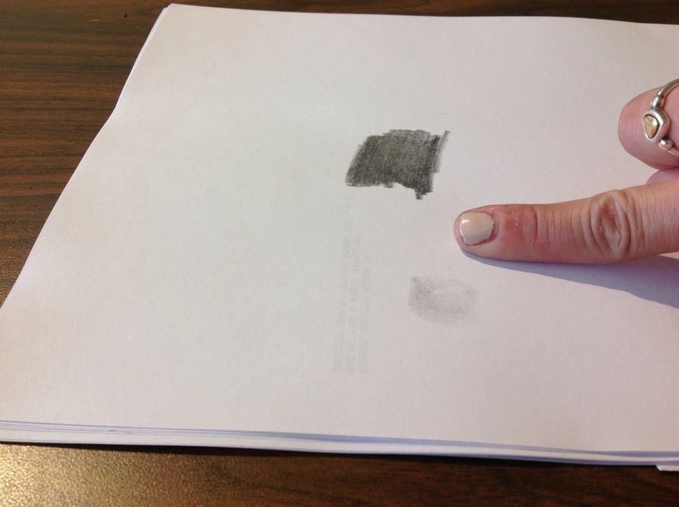then take your figure to a clean section of the paper and roll the tip of the finger back and forth