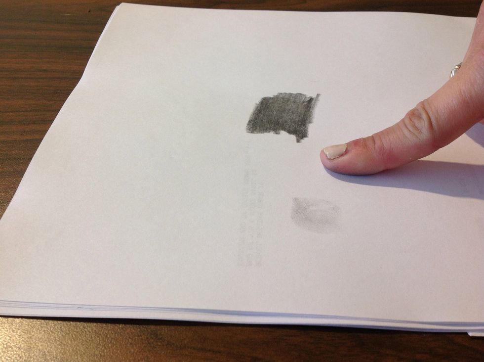then take your figure to a clean section of the paper and roll the tip of the finger back and forth