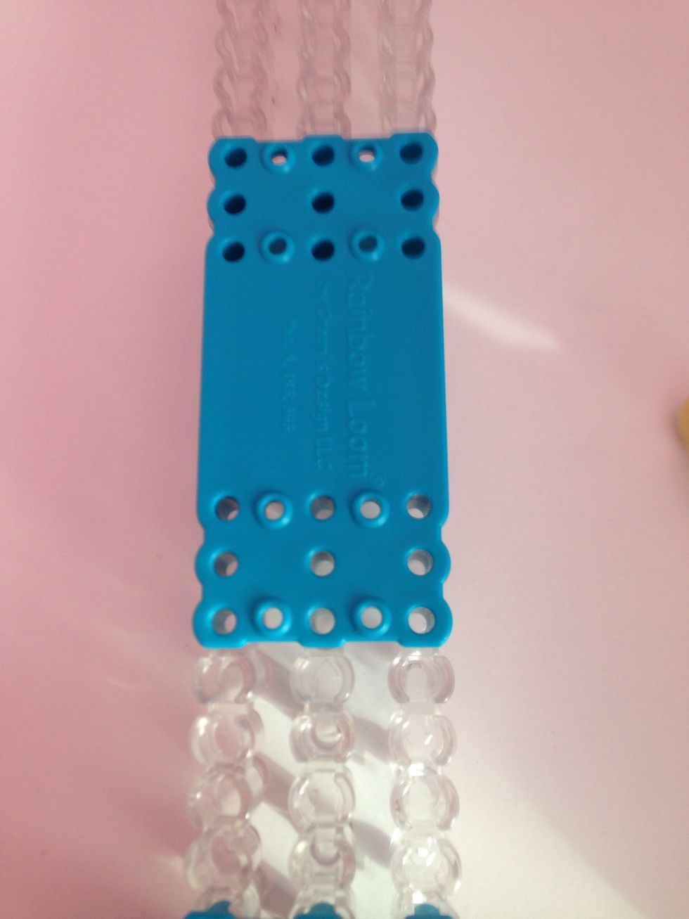 Then take your loom and turn it, like so.