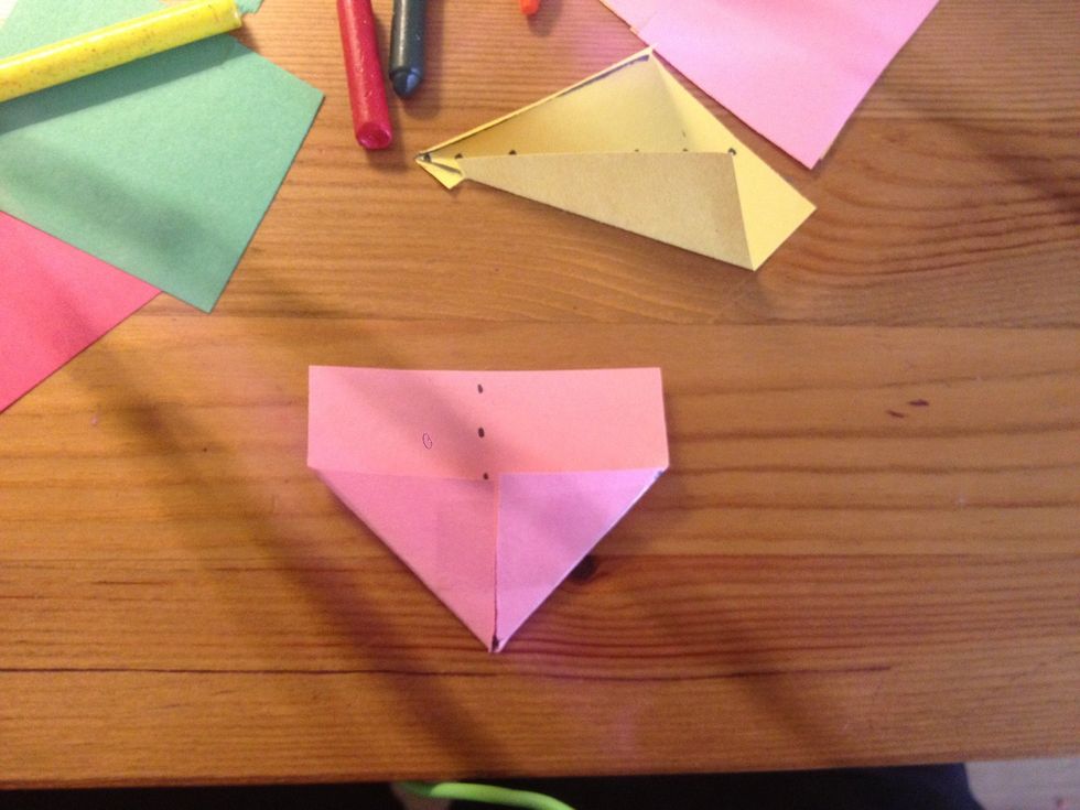 Then tape down folds. (You can use a glue stick of you don't want to see the tape.)