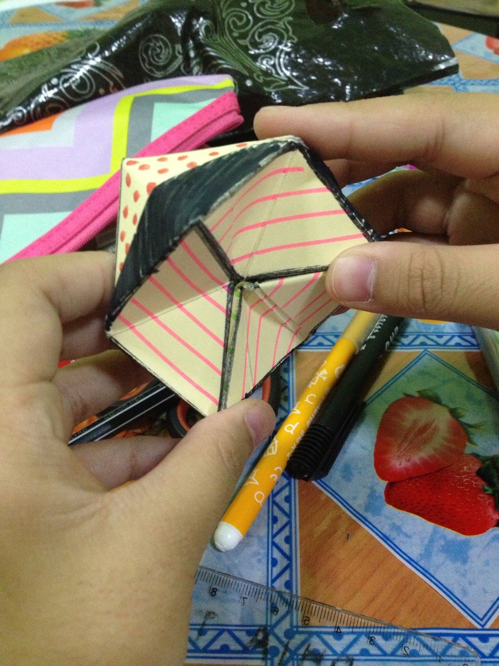 Then, tape the side where the paper is half.