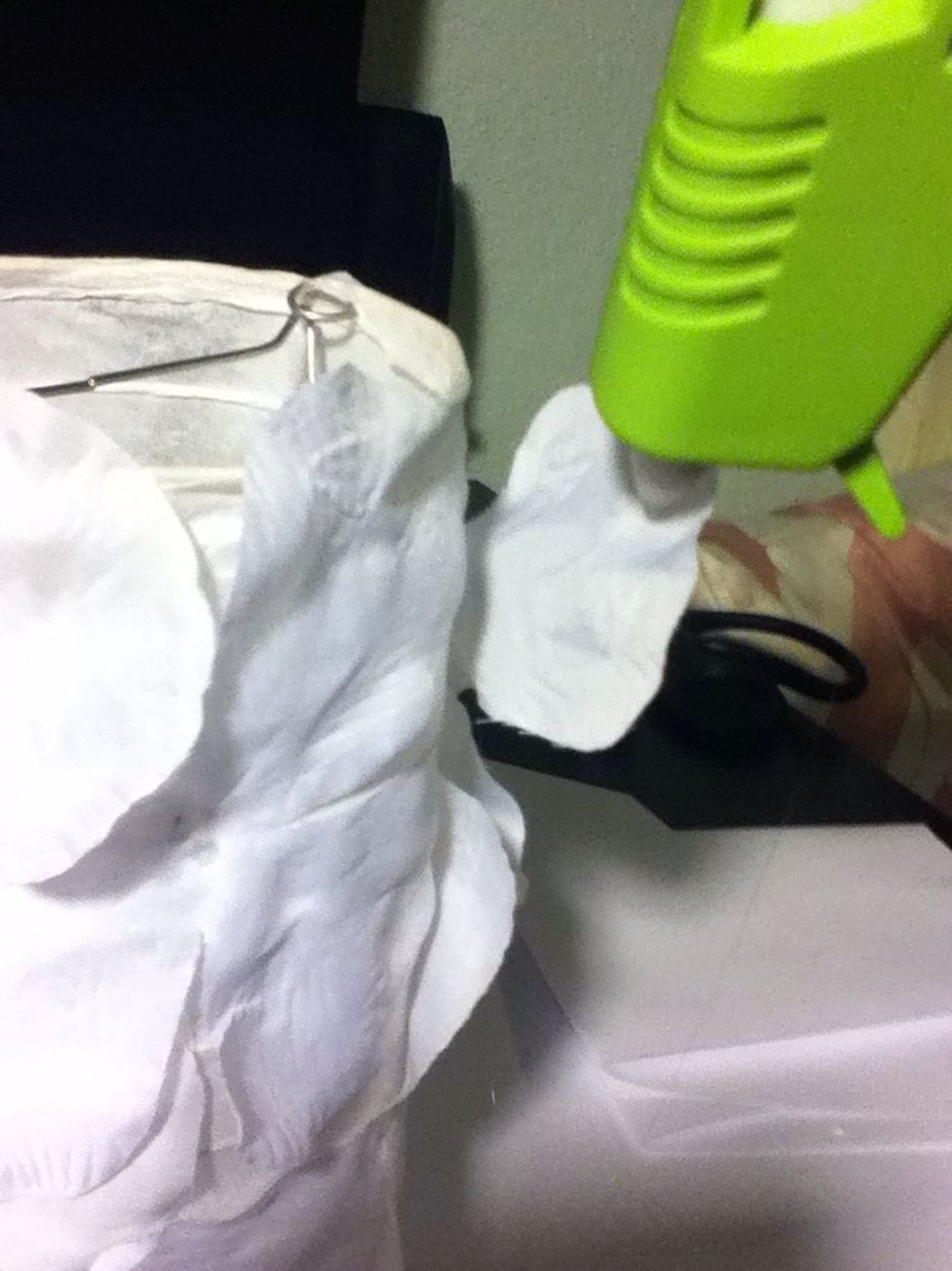 then the ends of the petals using as little glue as possible while still making them flat