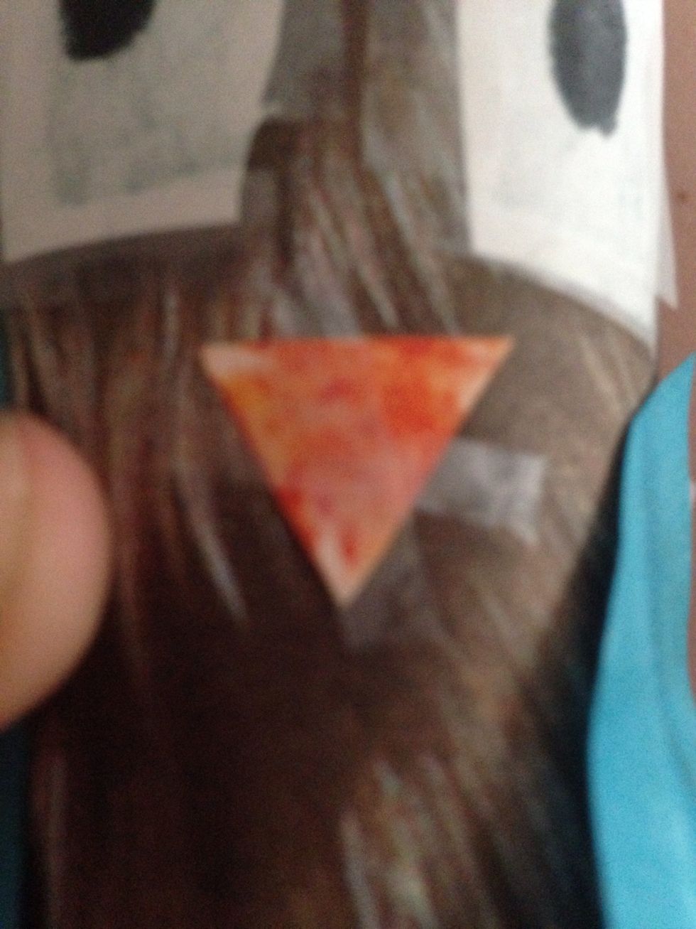 Then the nose make a triangle and color.Then tape...