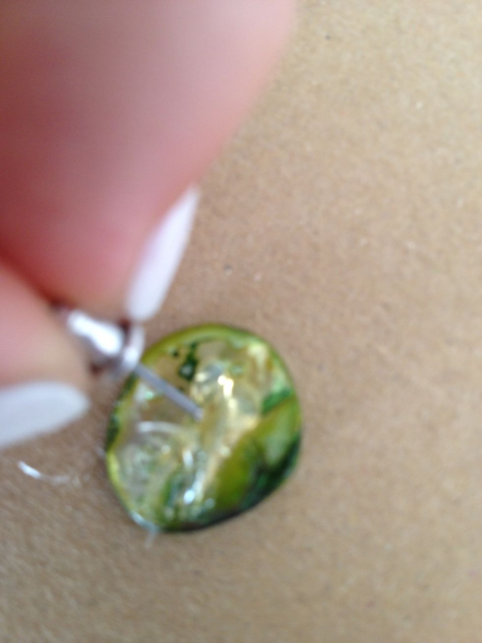 then the push the earring backs into the glue, make sure that it's straight. let dry.