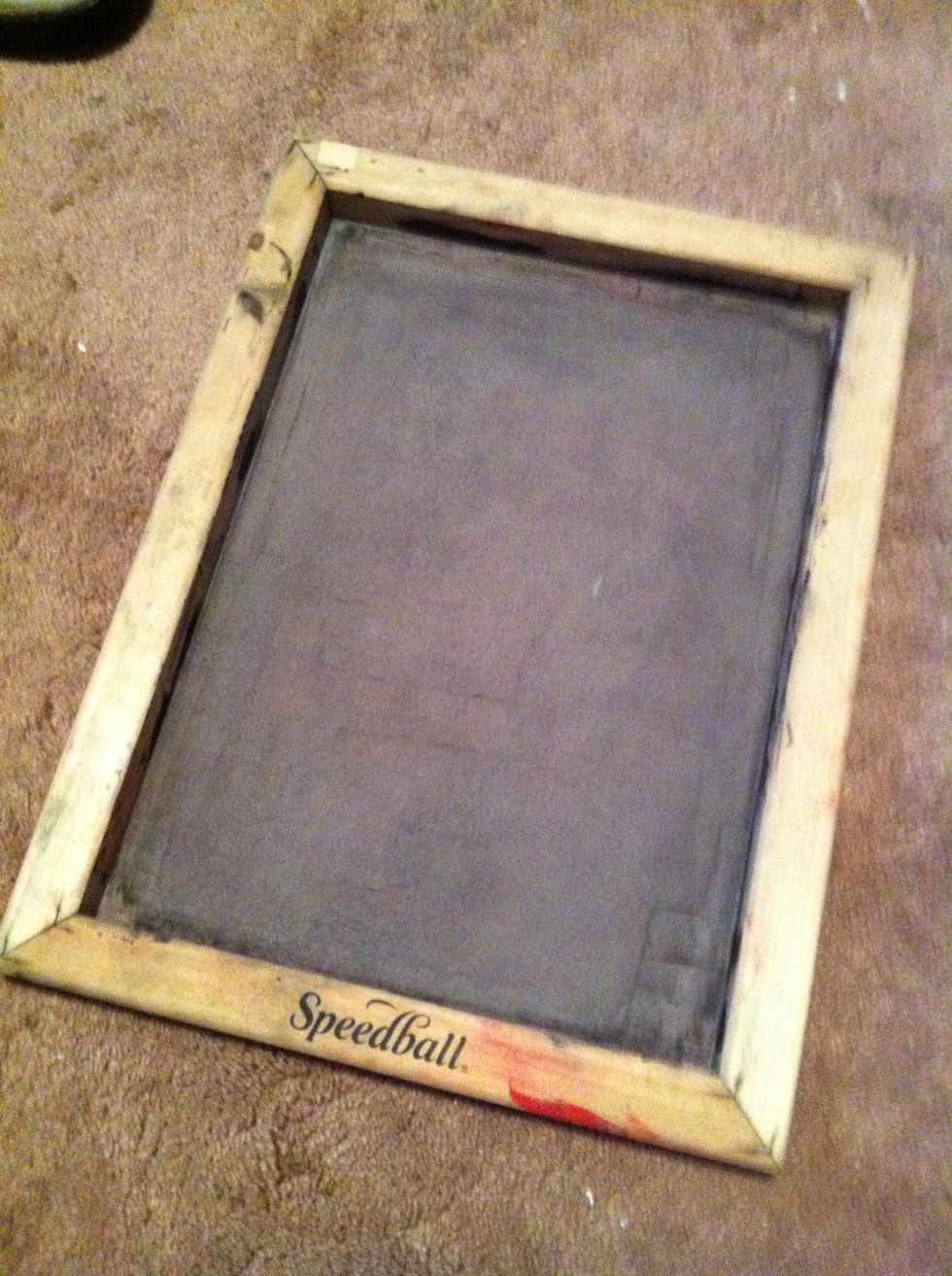 Then the stencil goes on the screen add a spoonful of speedball printing ink.