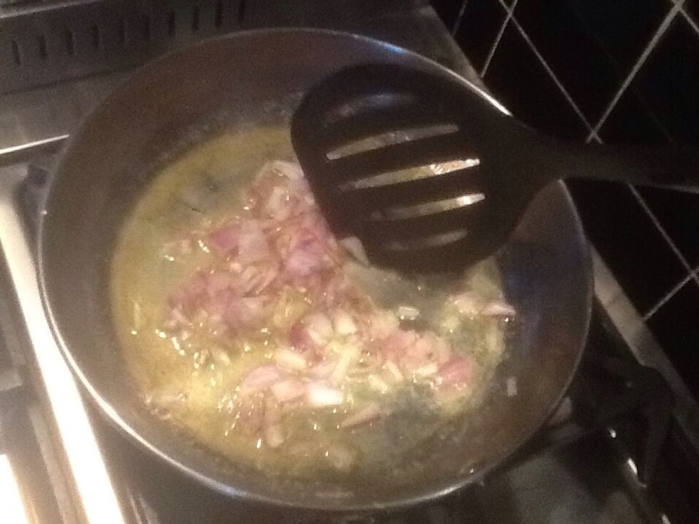 Then throw the onion into the pan with the oil and butter