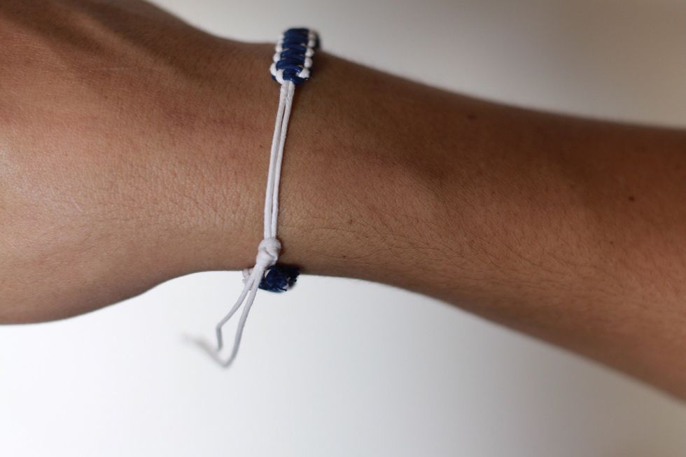 Then tie a knot at your desired tightness.