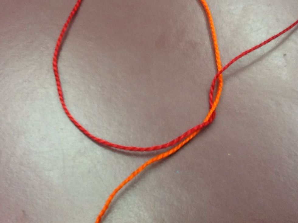 Then tie a knot pulling the string to the top.