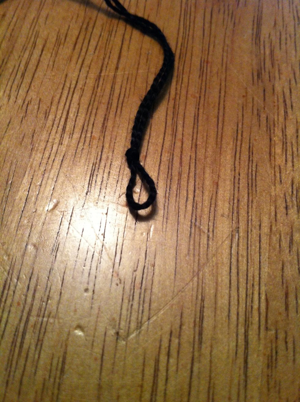 Then tie a knot so you end up with this loop. You may want to make your loop bigger if your not using key rings.
