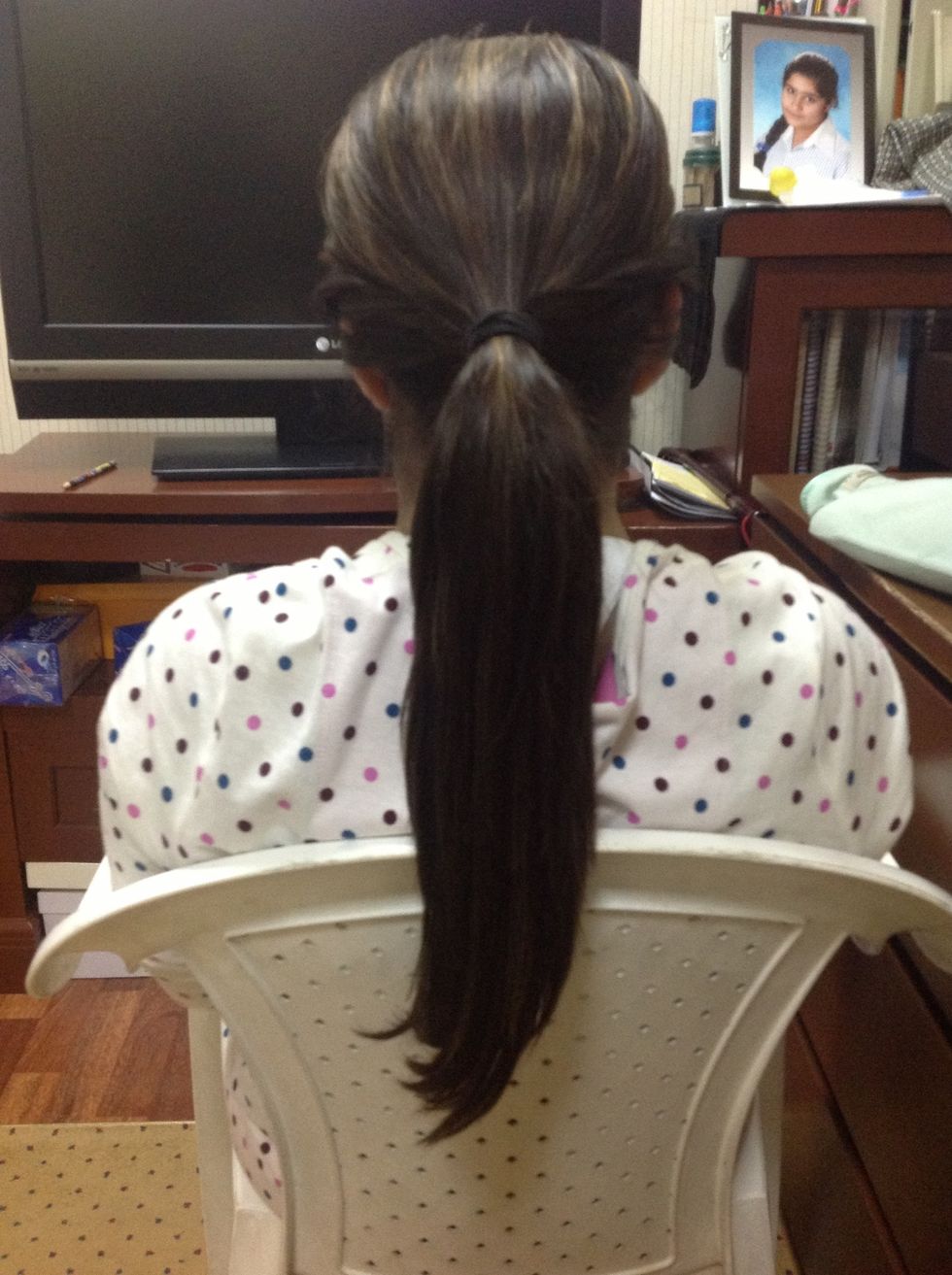 Then tie the hair together. Don't tie it very tight.