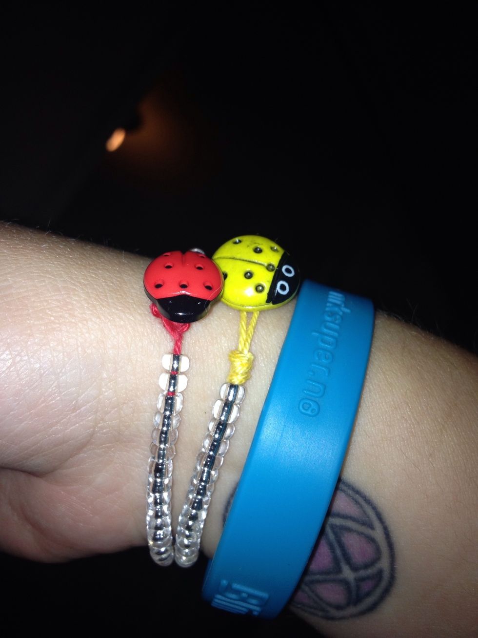 Then tie The other end in a sircle. Just so The button fits inside, and your done! Enjoy your new bracelet :)