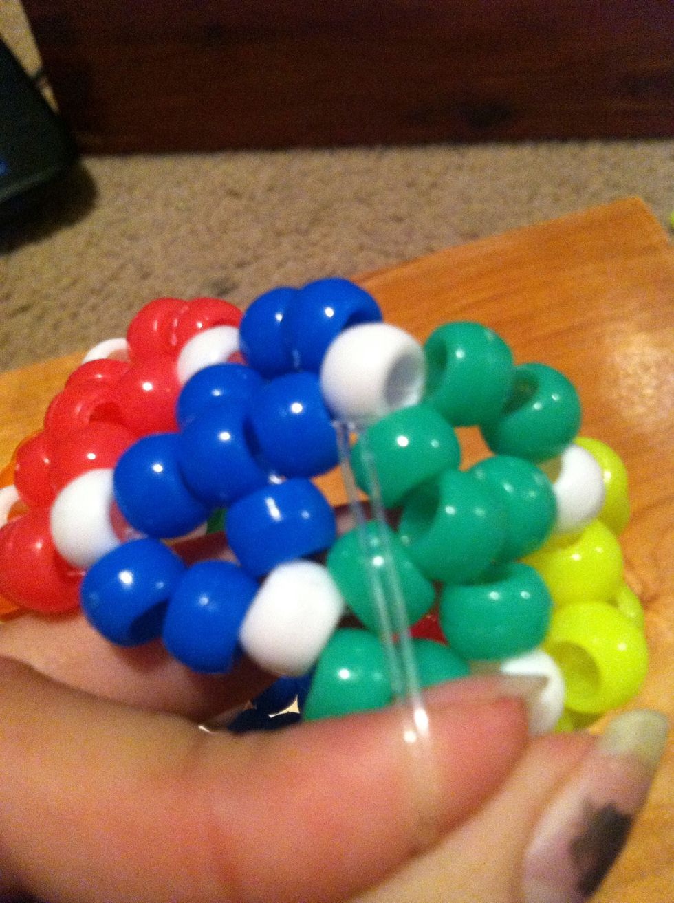 Then tie the strings together and cut!