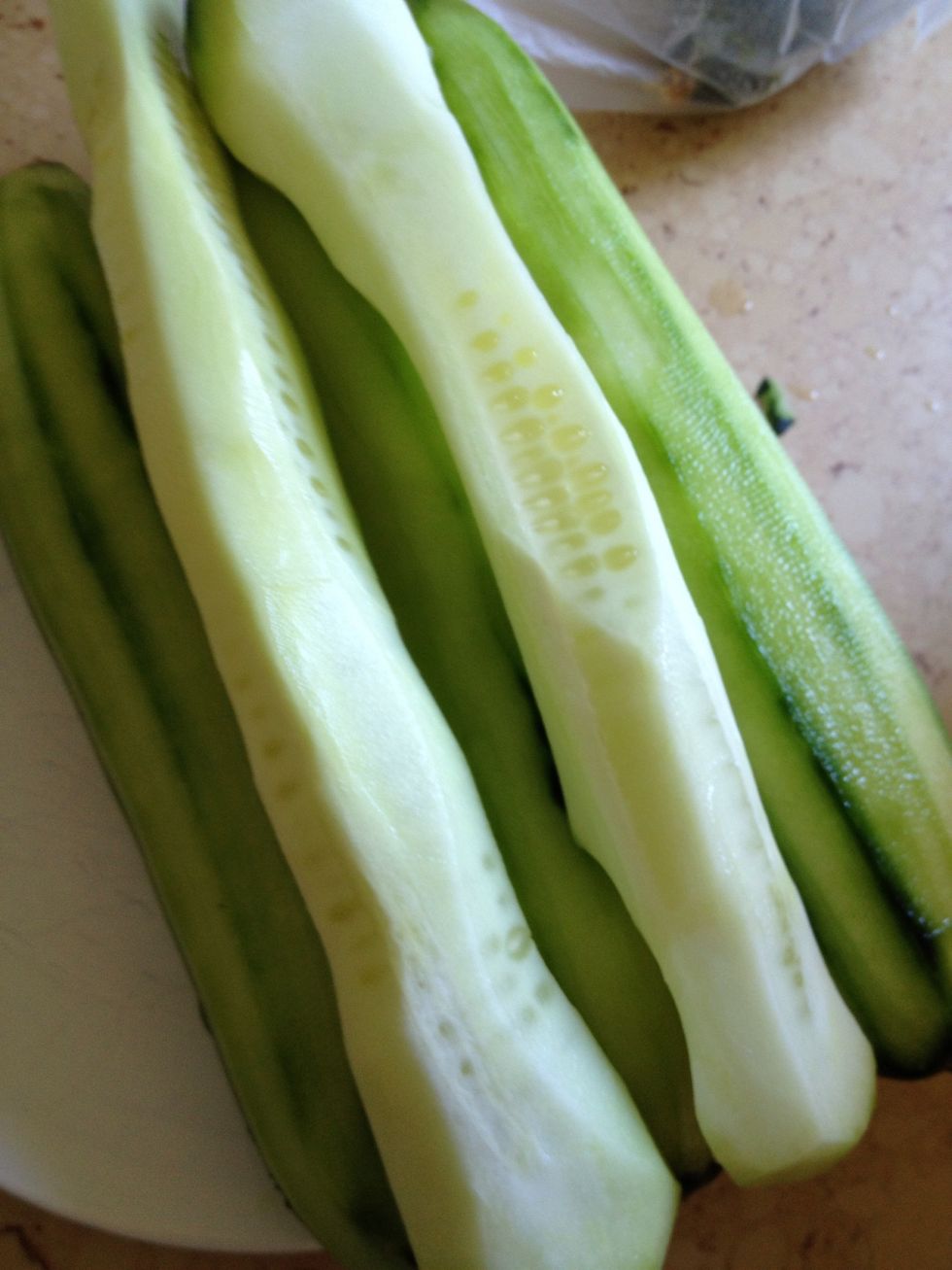 Then to the salad: continue peeling into a bowl until cucumber looks like this and you can do something else with the rest.