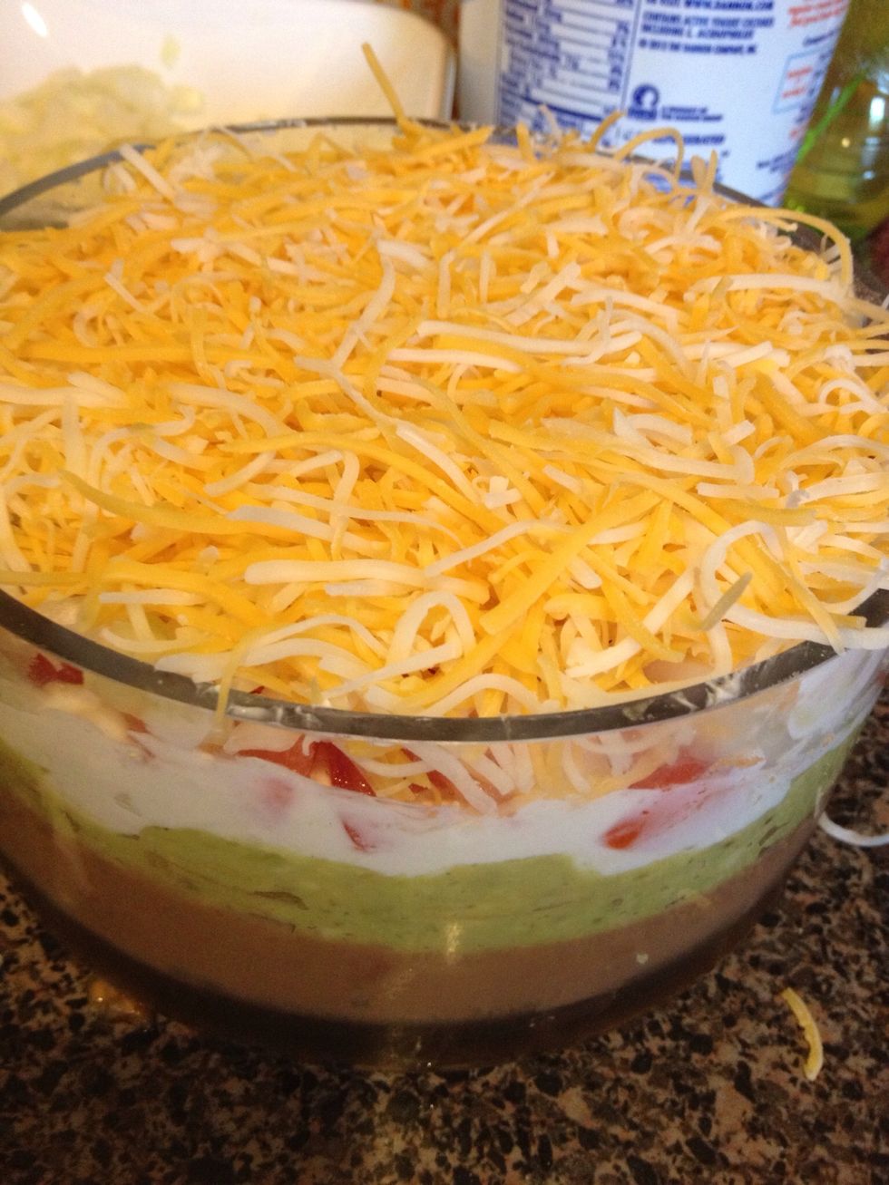 Then top of with Mexican cheese