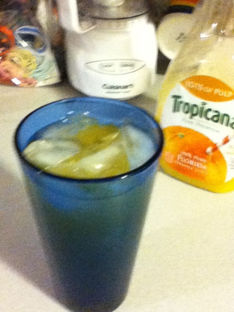 Then top off with orange. Use some super pulpy stuff, it's healthy for you! If you are James Bond, you can even use fresh-squeezed.