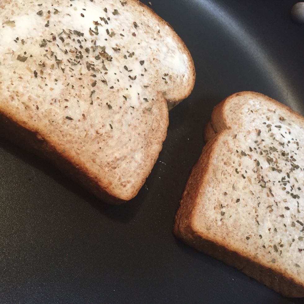 Then top with the second piece and flip to cook other side.