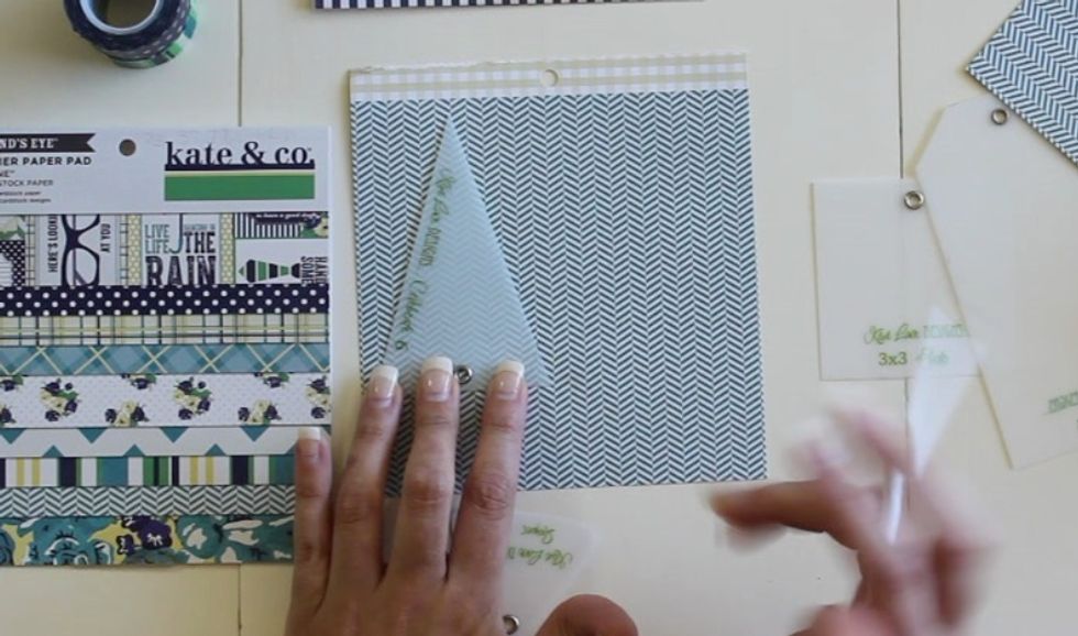 Then trace a bigger triangle at the base of the small triangle, turning the two shapes into one design for the bottom of the tie. I used KLD Celebrate 6 template.