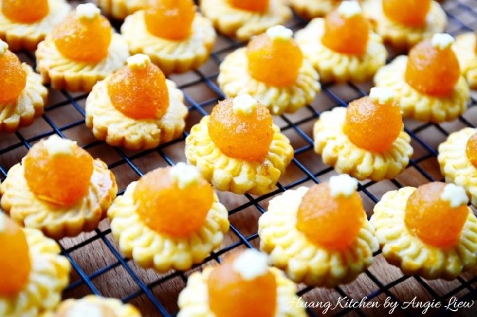Then transfer the baked pineapple tarts to a wire rack to cool completely.