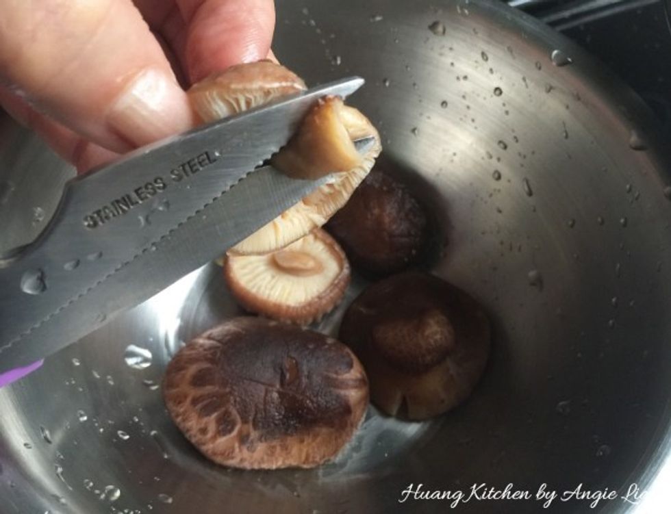 Then trim off and discard the tough stems of the mushrooms, squeeze out excess water with your hands and the mushrooms are ready to cook.