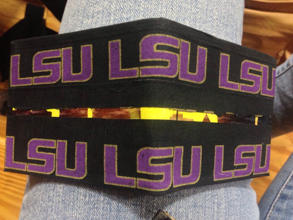 Then trip Signature Athletic Tape to get a small strip of color tape and add a it directly below the top row. This will make the spacing work between top row and bottom row.
