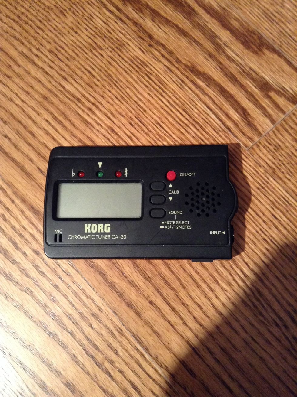 Then tune it by turning the screws on the bottom.